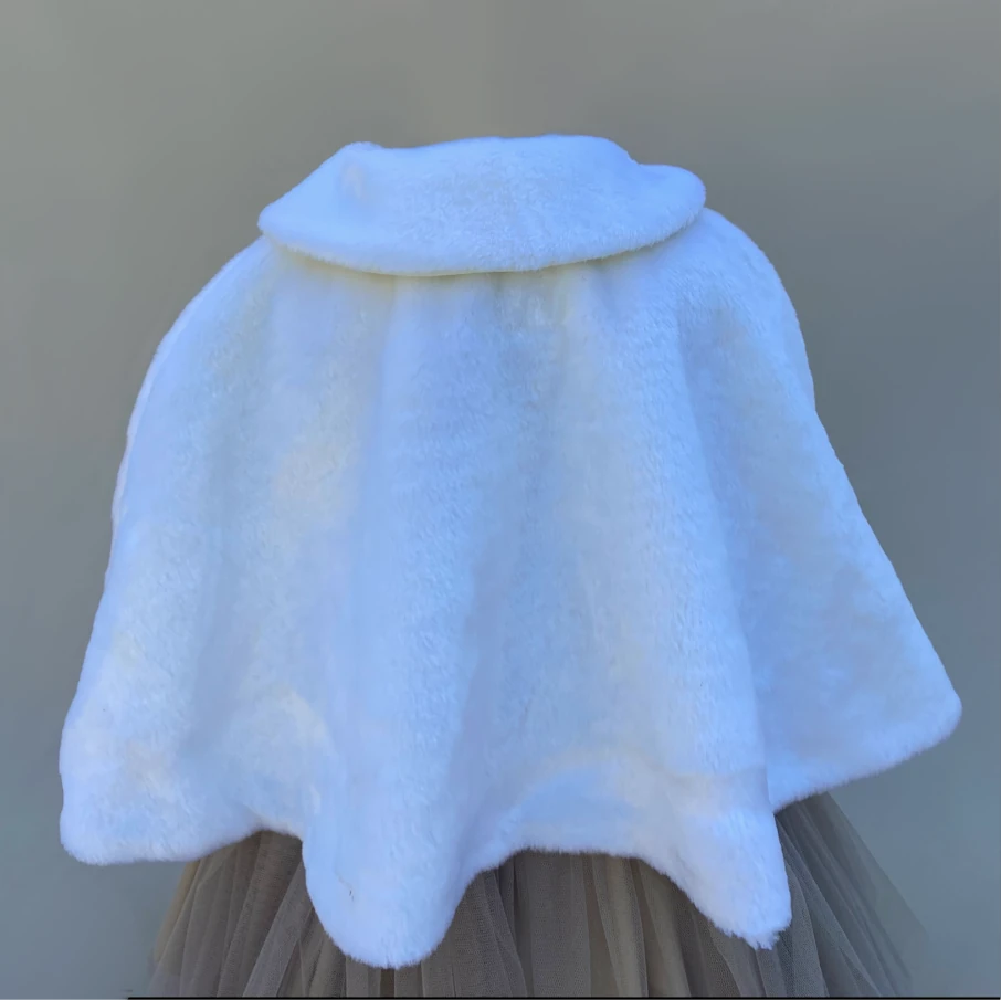 Ivory faux fur bolero sleeveless